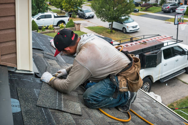 Professional Roof Replacement technician working in Leeds, ME